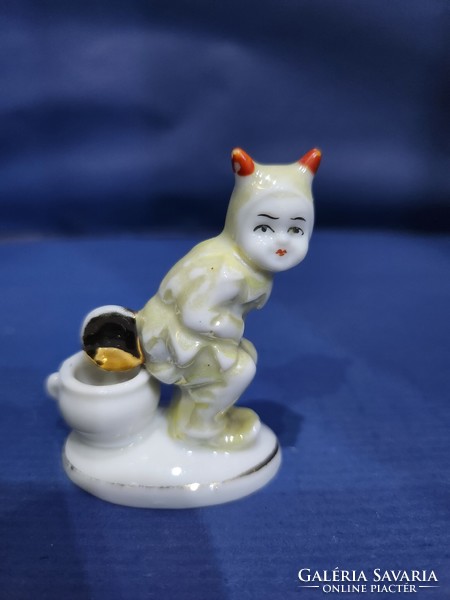 Antique porcelain golden money-laying child, little devil