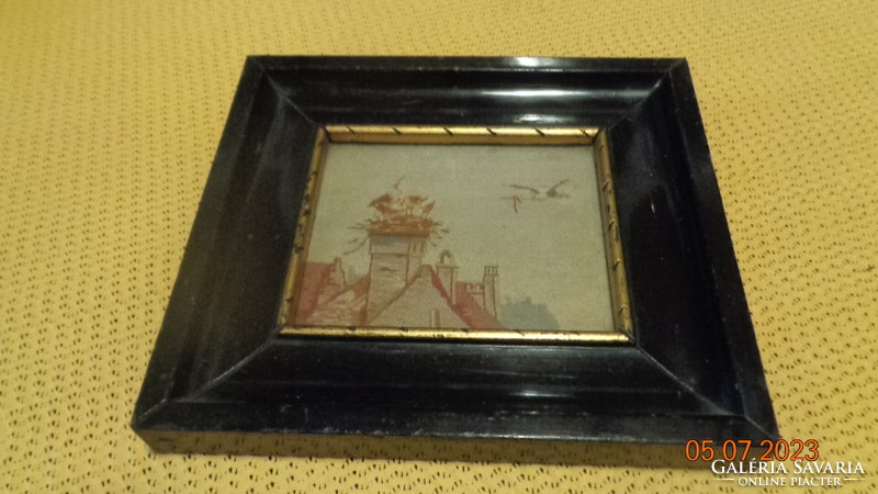 Landscape, stork still life on the chimney, woven, with a nice frame, 20 x 17 cm