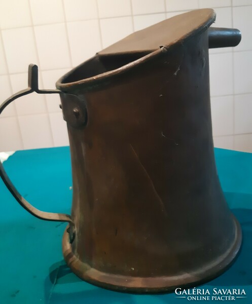 100-year-old bronze watering can
