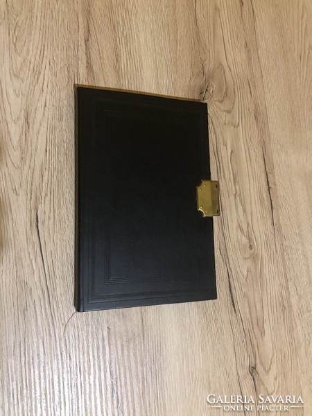 John's book with a golden clasp