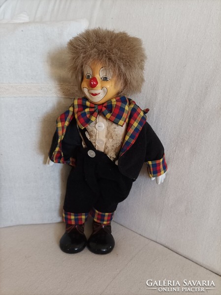 A wonderful, funny clown with a ceramic head