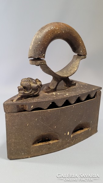 Old marked lion head iron