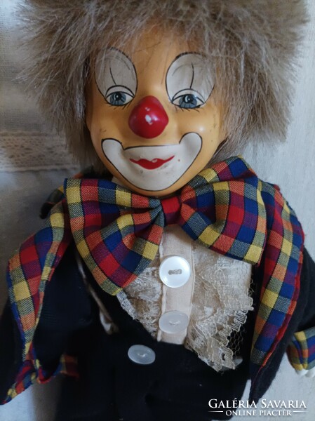 A wonderful, funny clown with a ceramic head