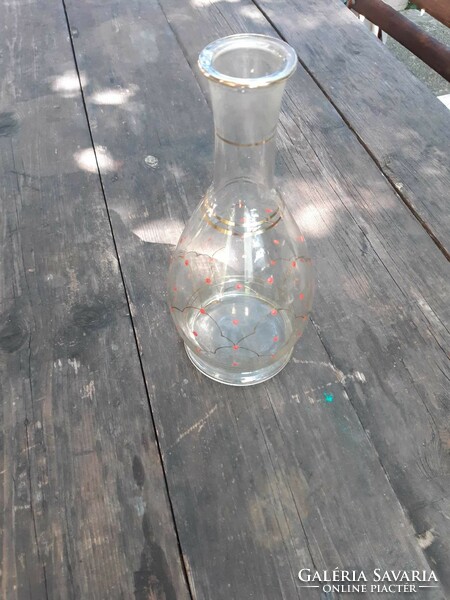 Red speckled glass jug with gold decoration