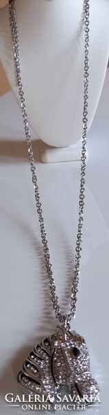 Diamond-cut silver-plated chain with rhinestone zebra pendant.