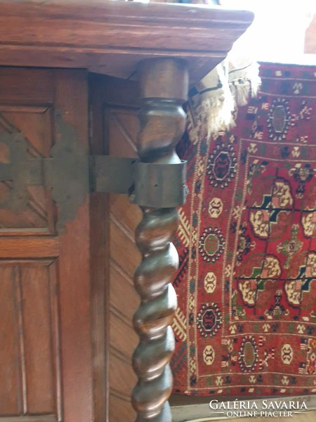 Antique Flemish sideboard with wrought iron hinges. With beautiful hand carvings.