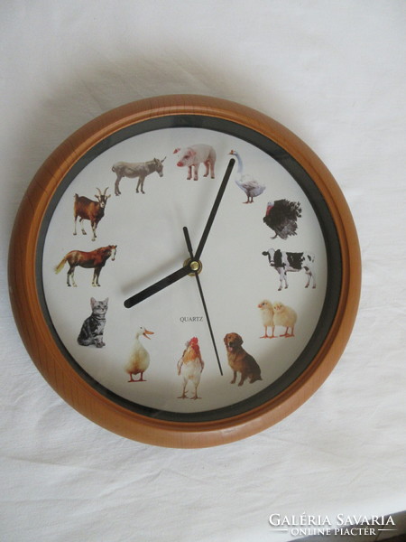 Wall clock imitating animal sounds. Negotiable!