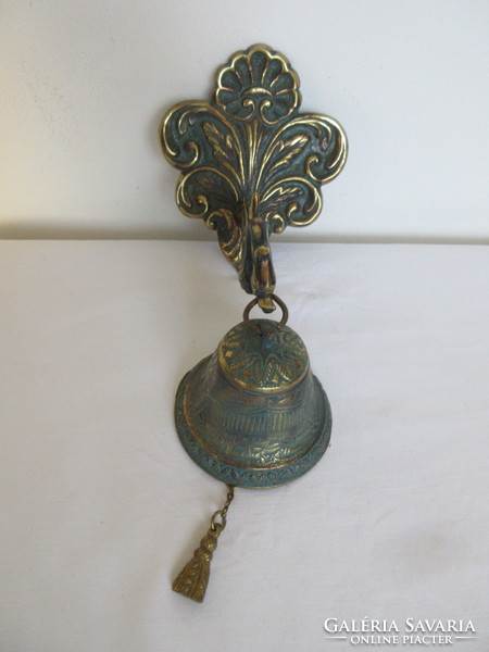 Old brass bell. It can be placed on the wall or on the door. Negotiable!