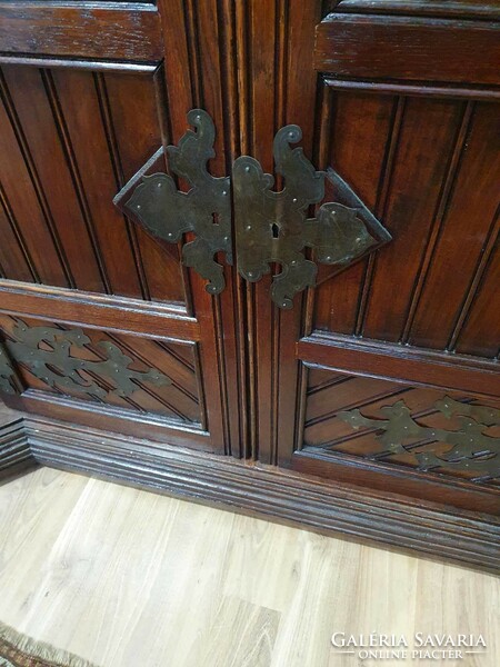 Antique Flemish large cabinet with wrought iron hinges. With beautiful hand carvings. Right for his age