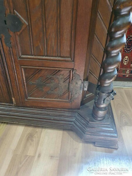 Antique Flemish sideboard with wrought iron hinges. With beautiful hand carvings.