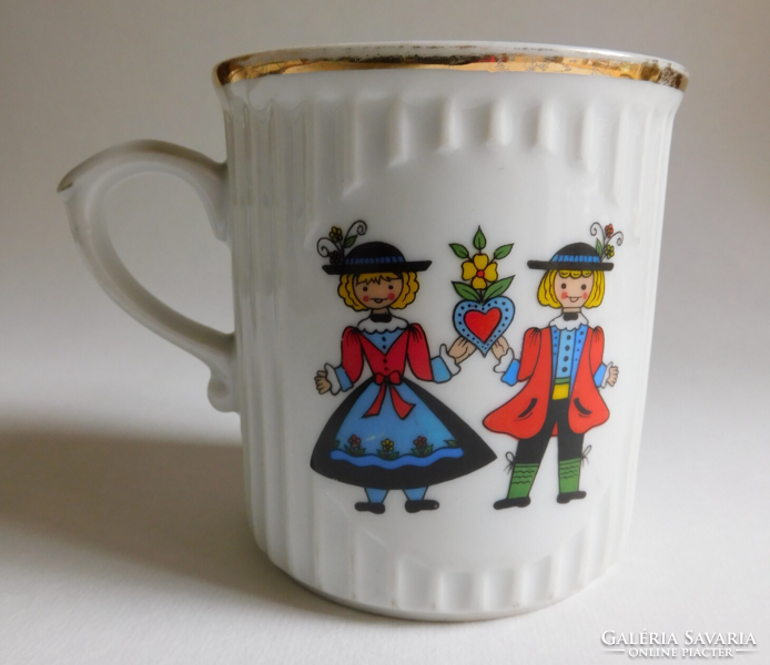 Vintage bohemian mug with a couple in Austrian folk costume and a view of the Melk Abbey