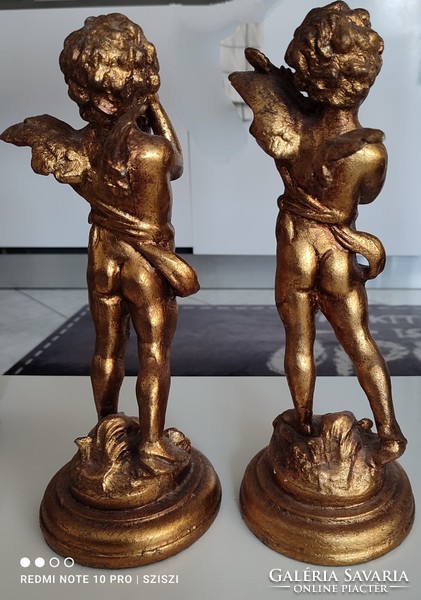 A pair of standing angels.