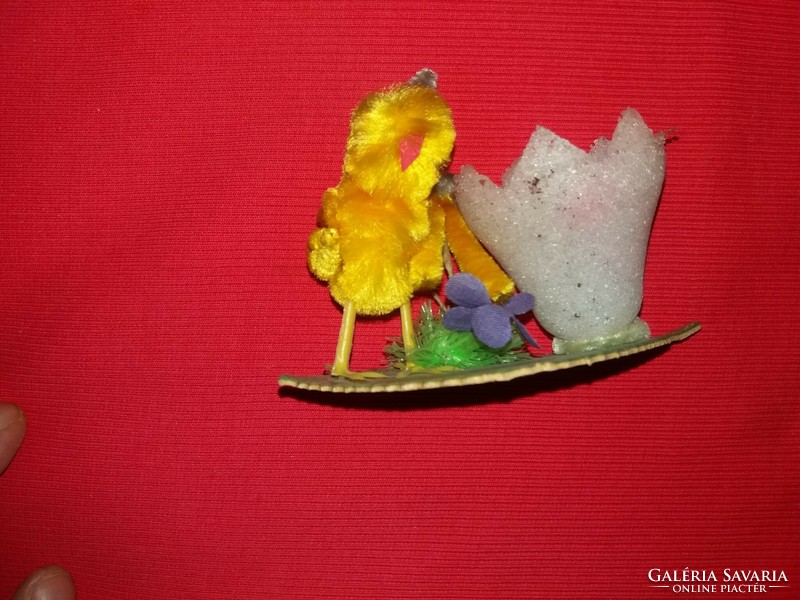 Antique Easter table decoration with an egg holder and a small chick in a wire frame, as shown in the pictures