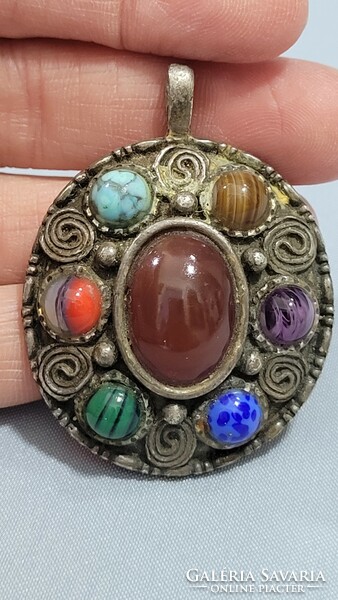 Silver-plated (miracle) pendant with semi-precious stones.