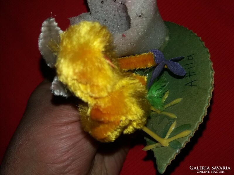 Antique Easter table decoration with an egg holder and a small chick in a wire frame, as shown in the pictures