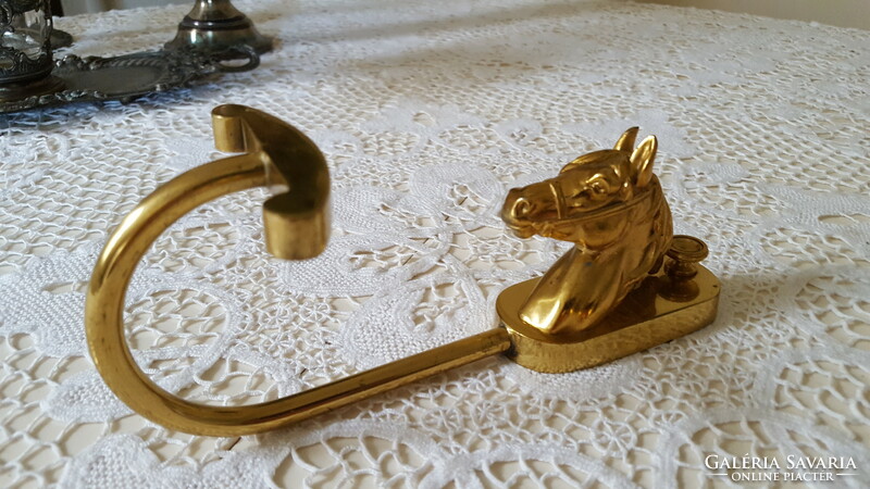 Brass hanger in the shape of a horse's head