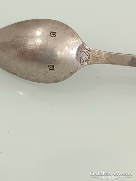 The antique silver spoon shown in the picture is for sale!