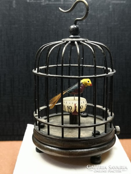 Bird cage clock.
