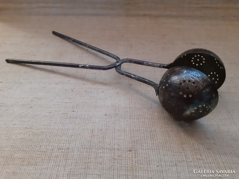 Old snowball baking spoon with wrought iron handle