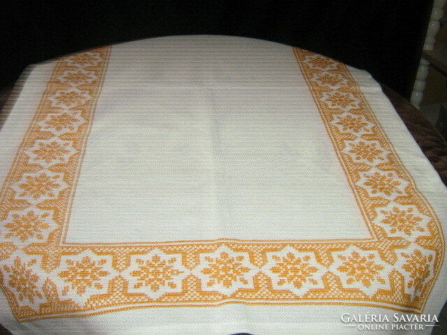 Beautiful hand-embroidered woven tablecloth with cross stitch