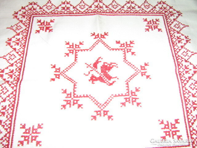 Beautiful red tablecloth with cross-stitch embroidery