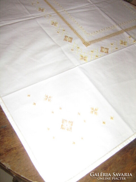 Beautiful and elegant azure tablecloth with cross-stitch embroidery