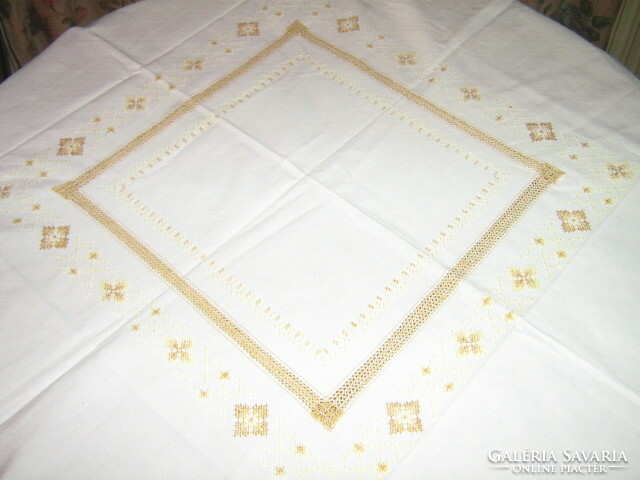 Beautiful and elegant azure tablecloth with cross-stitch embroidery