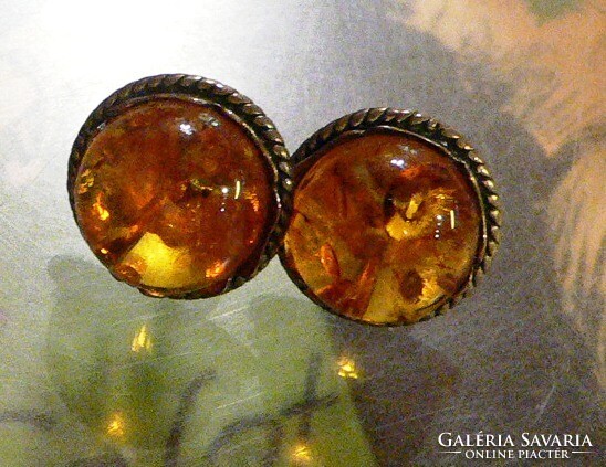 Three amber earrings