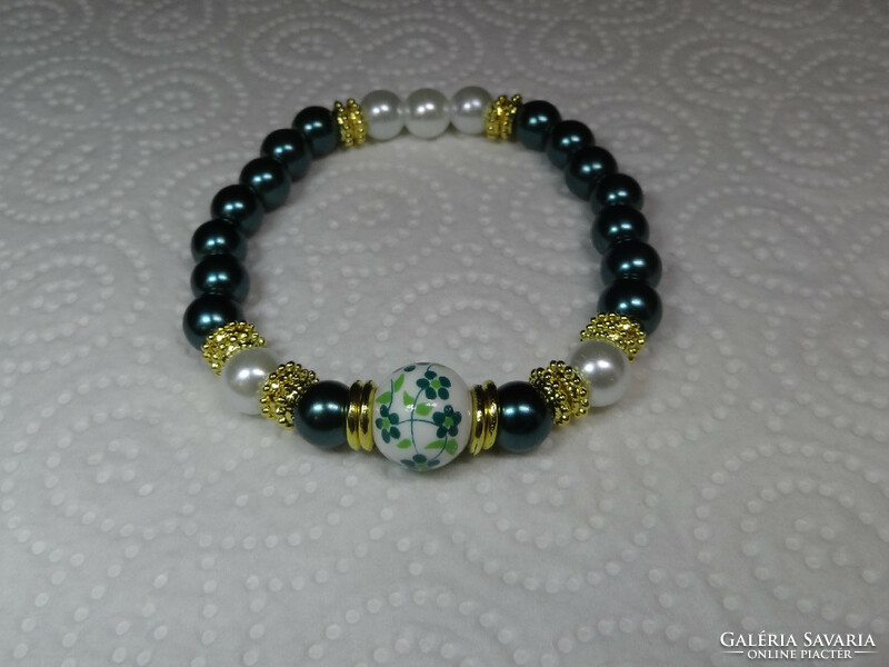 Summer momentum bracelet, made of glass pearls, with gold-colored decoration