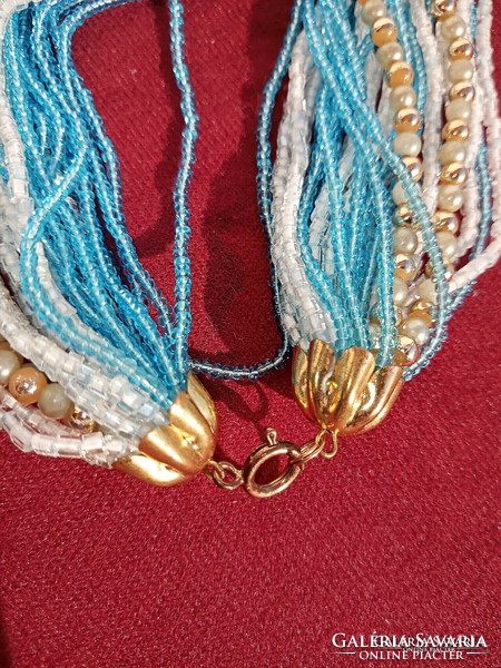 Never used, retro, colorful (blue, white, gold), multi-line string of pearls from 1986