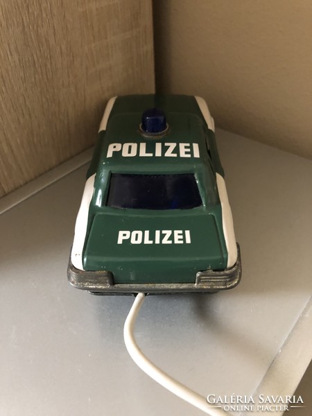 Old license plate Mercedes police car with remote control