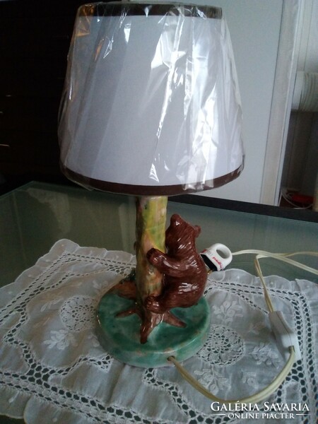 Ceramic lamp with a bear running away from a small frog, beautiful colors, new hood.
