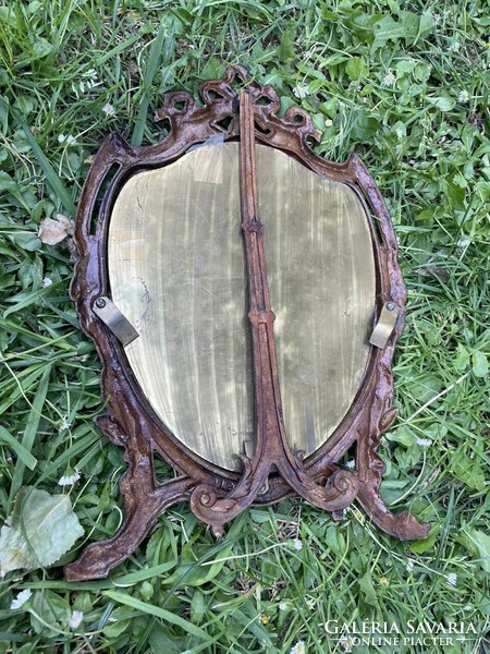 Old bowed copper picture frame