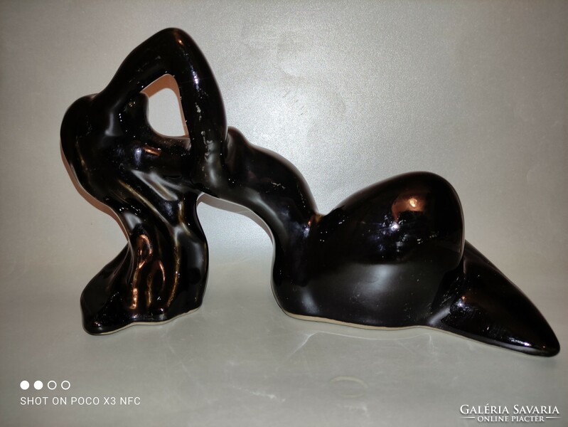 As a gift, there are 3 pieces of a marked ceramic, glossy glazed reclining female nude sculpture, Manuel felguerez style, available