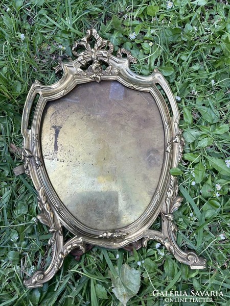 Old bowed copper picture frame