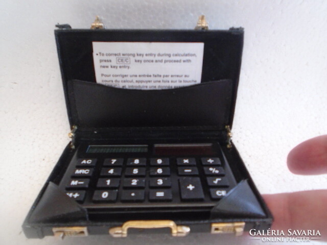 A miniature calculator installed in a diplomatic bag is a curiosity!!!!!!