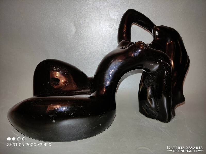 As a gift, there are 3 pieces of a marked ceramic, glossy glazed reclining female nude sculpture, Manuel felguerez style, available