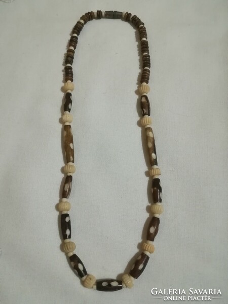 Handcrafted, carved bone necklace.