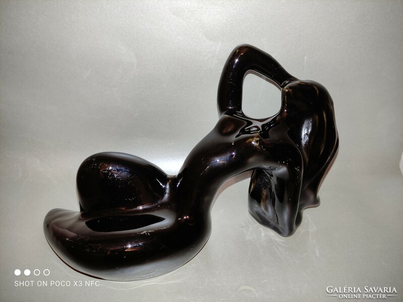 As a gift, there are 3 pieces of a marked ceramic, glossy glazed reclining female nude sculpture, Manuel felguerez style, available