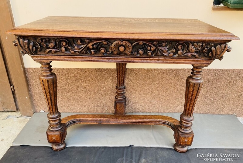 Lion head carved oak console table. Renovated