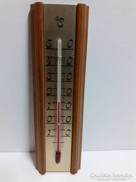 Old wooden wall thermometer can be used in preserved condition