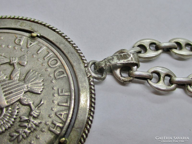 Kennedy half dollar in silver pendant on thick silver chain