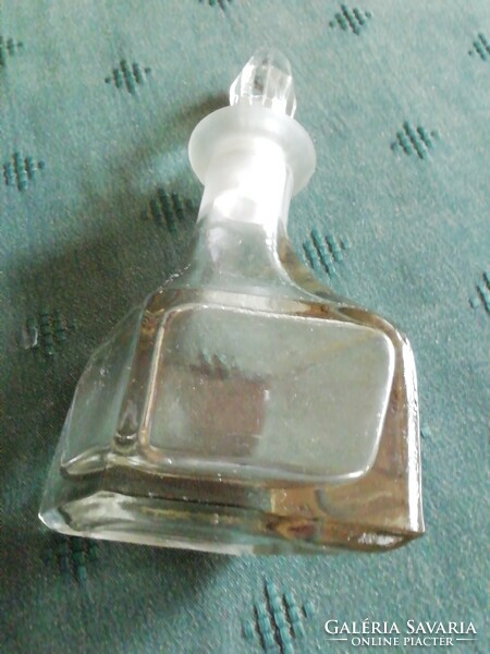 Old oil/vinegar bottle with polished glass stopper.