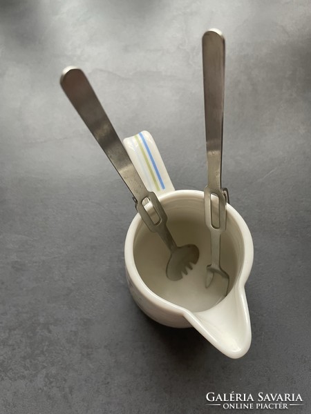 Small inox picker in a spoon and fork set