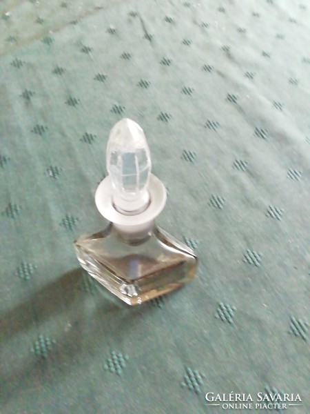 Old oil/vinegar bottle with polished glass stopper.