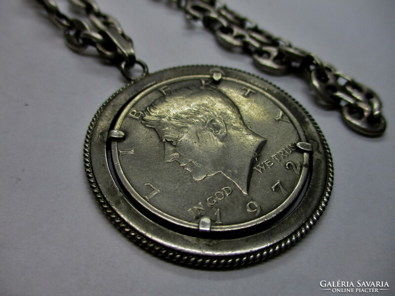 Kennedy half dollar in silver pendant on thick silver chain