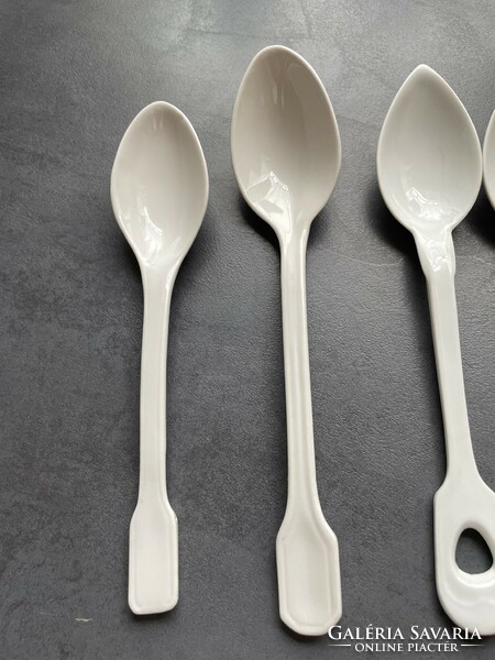 Old white porcelain larger spoon
