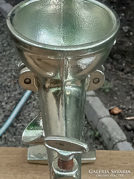 Vintage cast iron herb or tomato grinder
