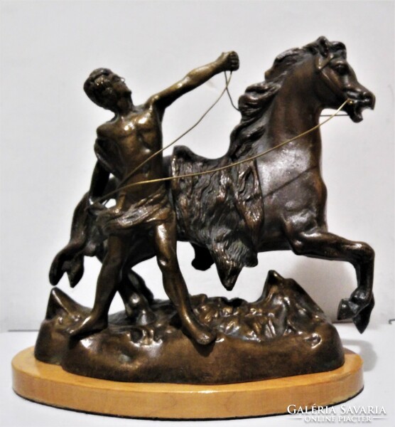 Young man with his horse, bronze statue