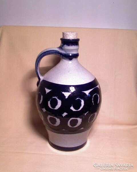 Glazed blue ceramic jug